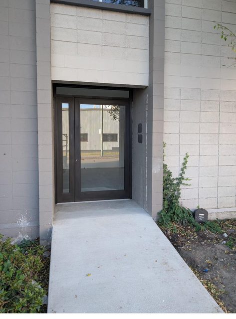 Commercial storefront entry door glass replaced in Vancouver
