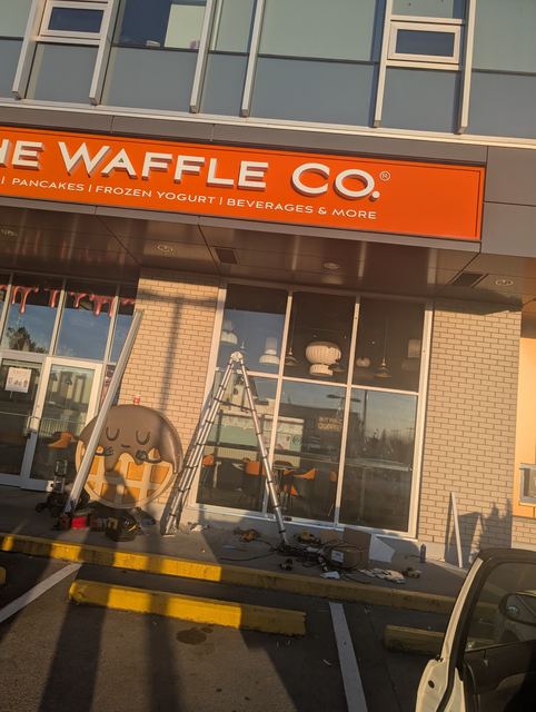 Storefront glass installation with suction cups