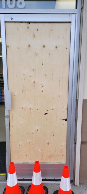 Boarded commercial door secured overnight