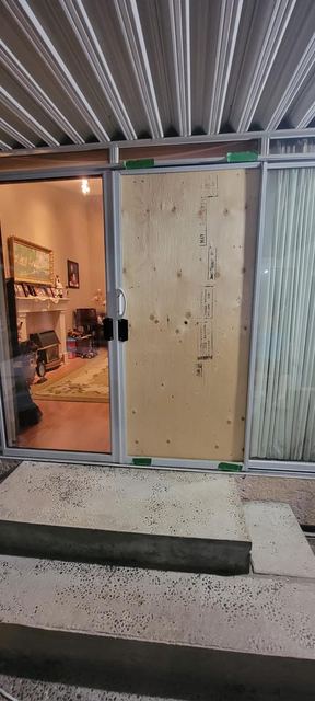 Board-up under a security shutter