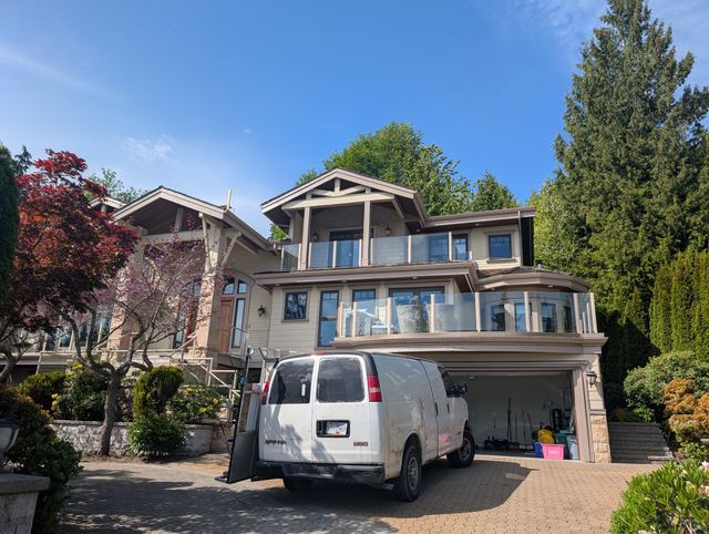 Sparkle Glass service van at a Lower Mainland home