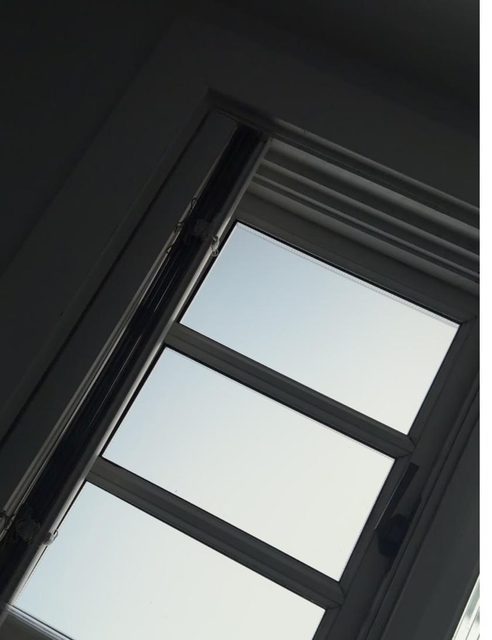 Clerestory windows above a stairwell in a Vancouver home