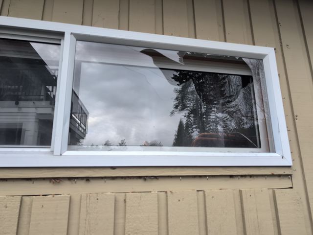 Cracked window pane before replacement