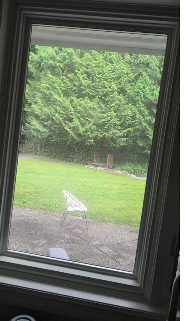Foggy double-pane window with a failed seal before sealed unit replacement